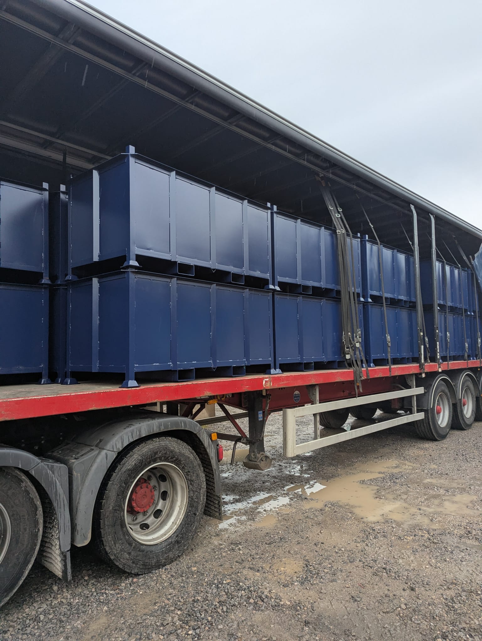 Scrap metal collection bins on van